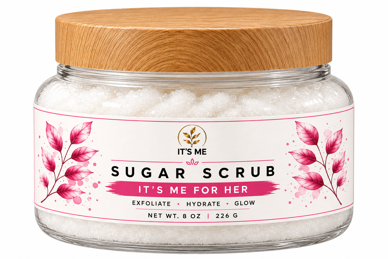 A jar of IT'S ME Sugar Scrub with a light wood lid and a white label featuring pink floral illustrations. The label reads 'IT'S ME SUGAR SCRUB IT'S ME FOR HER' and indicates a net weight of 8 oz (226 g).