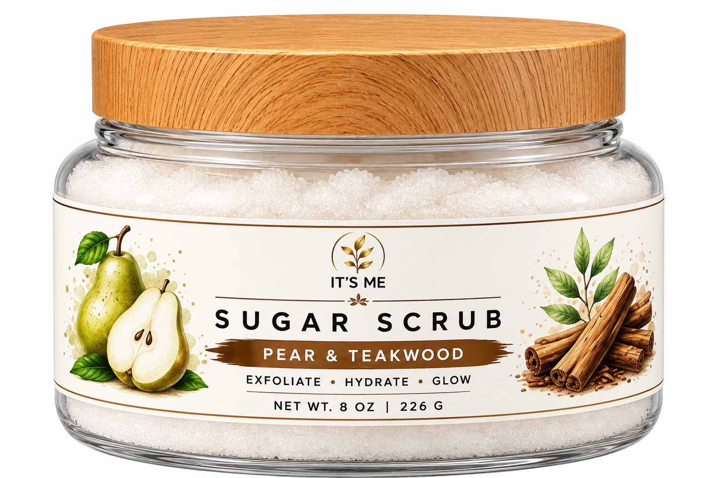 A jar of 'It's Me' Sugar Scrub in Pear & Teakwood scent, featuring white sugar crystals inside a clear glass jar with a light brown wooden lid and a cream-colored label with pear and cinnamon illustrations.
