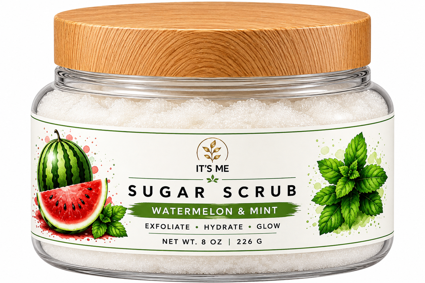 A jar of It's Me Sugar Scrub in Watermelon & Mint scent, featuring white sugar crystals inside a clear glass jar with a light brown wooden lid and a white label decorated with watermelon and mint illustrations.
